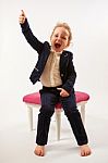 Little Girl In Black Suit Stock Photo