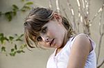 Little Girl Posing Outdoors Stock Photo