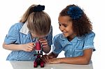 Little Girls Looking Into Microscope Stock Photo