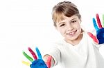 Little Kid With Painted Hands Stock Photo