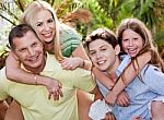 Loving Father And Son Gives Piggyback Stock Photo