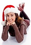 Lying Woman Wearing Santa Hat Stock Photo