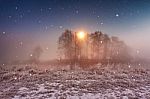 Magic Winter Christmas Night. Snowfall Scene On A River Stock Photo