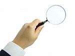 Magnifying Glass In Hand Stock Photo