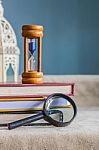 Magnifying Glass On A Book Stock Photo