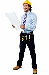 Male Architect With Construction Plan Stock Photo