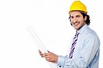 Male Architect With Construction Plan Stock Photo