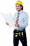 Male Architect With Construction Plan Stock Photo