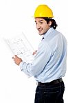 Male Architect With Construction Plan Stock Photo