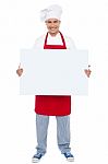 Male Chef Holding Blank Board Stock Photo