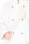 Male Chef Holding Mixing Spoon Stock Photo