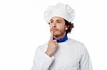 Male Chef Lost In Deep Thought Stock Photo