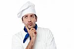 Male Chef Lost In Deep Thoughts Stock Photo