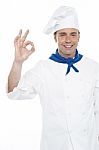 Male Chef Showing Ok Gesture Stock Photo