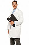 Male Doctor Holding Clipboard Stock Photo