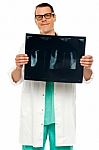 Male Doctor holding X Ray Stock Photo