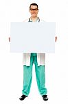 Male Doctor Showing Blank Board Stock Photo