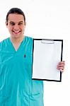 Male Doctor With Empty Notepad Stock Photo