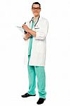 Male Doctor Writing Prescription Stock Photo