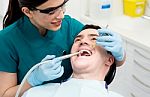 Male Getting His Teeth Examined Stock Photo