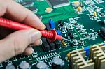 Male Hands Close Up Checking Voltage On Transistor Stock Photo