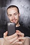 Male Holding Smartphone Stock Photo