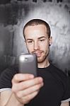 Male Holding Smartphone Stock Photo