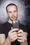 Male Holding Smartphone Stock Photo