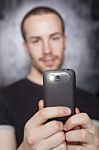 Male Holding Smartphone Stock Photo