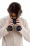 Male Looking Downward Through Binocular Stock Photo