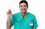 Male Physician Posing With Stethoscope Stock Photo