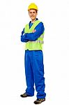 Male Repairman With Arm Crossed Stock Photo