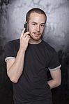 Male talking over phone Stock Photo