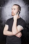 Male talking over phone Stock Photo