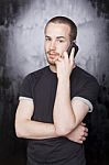 Male talking over phone Stock Photo