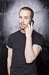 Male talking over phone Stock Photo