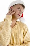 Male With Christmas Hat And Looking Upward Stock Photo