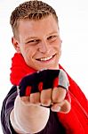 Male With Towel Showing Punch Stock Photo