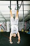 Man Balancing On Ring Stock Photo