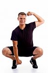 Man doing sitting exercise Stock Photo