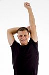 Man doing Stretching exercise Stock Photo