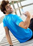 Man Drinking Water After Sport Activities Stock Photo