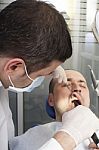 Man Having His Teeth Examined Stock Photo