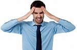 Man Having Severe Headache Stock Photo