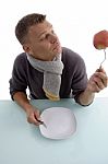 Man Holding Apple With Fork Stock Photo