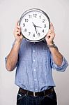 Man Holding Clock, Show Time To You Stock Photo