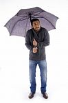 Man Holding Umbrella Stock Photo