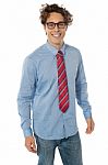 Man In Blue Shirt, Jeans And Tie Stock Photo