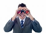 Man Looking Through Binoculars Stock Photo