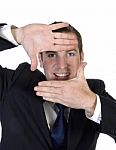 Man Making Frame Shape With Fingers Stock Photo